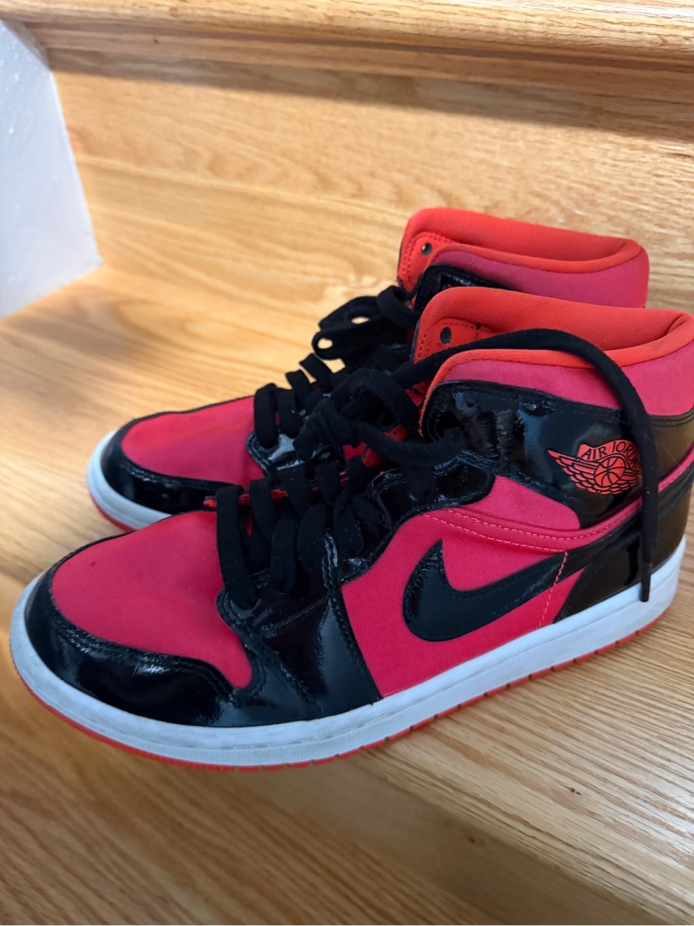 Jordan men’s  High-Top Sneakers in Red and Black